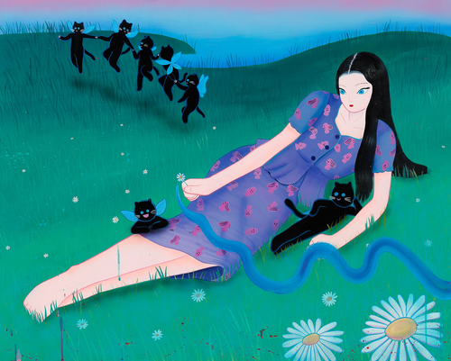 Female lying down on the grass, in a blue and pink dress