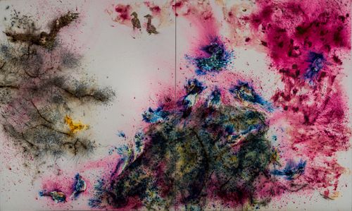 white canvas with three main bodies of colourful paint splashed onto it, mainly using pinks and blues