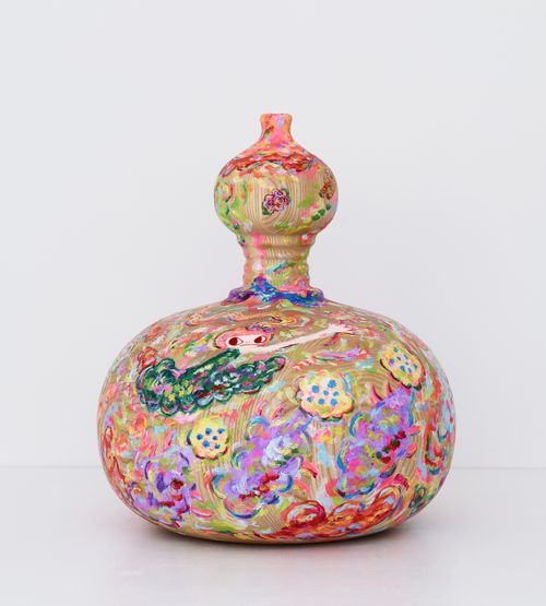painted wooden vase-shaped sculpture
