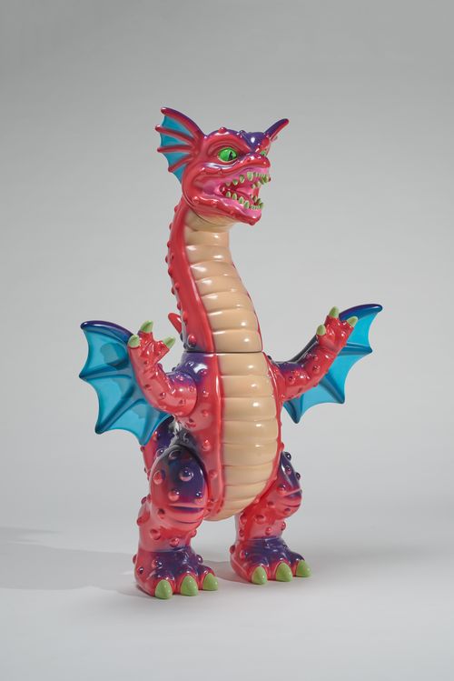 a sculpture of a red dragon