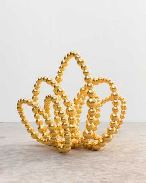 three-dimensional curled loops of large golden beads forming a lotus flower shape
