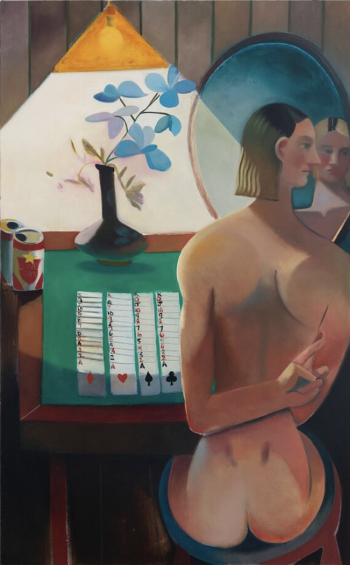 a nude woman sitting at a table with a deck of playing cards laid out on it