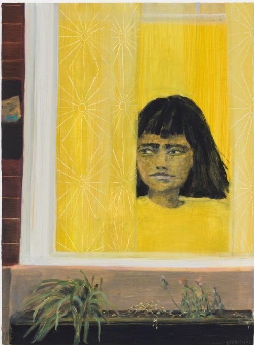 woman in a yellow top looking out through a window with yellow curtains