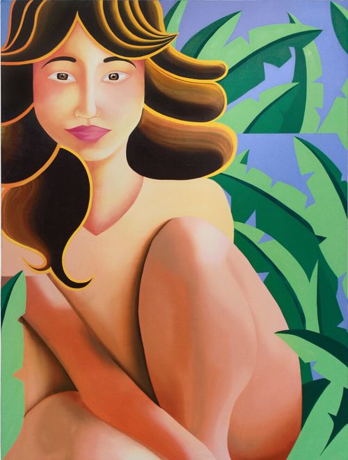 Naked woman sits amongst leaves