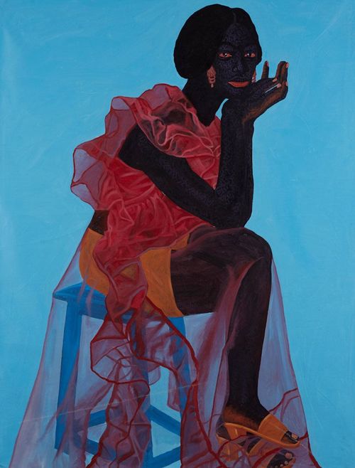 portrait of a woman sat on a blue stool with a long sheer red robe on over an orange skirt and shoes