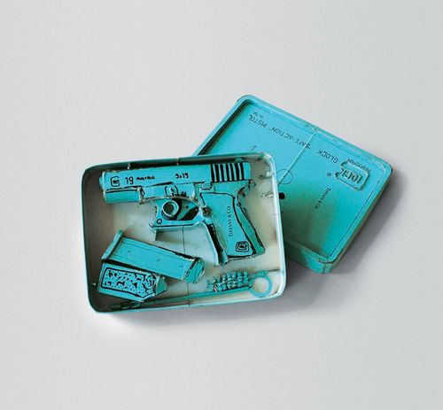 tiffany-branded pistol in matching tin
