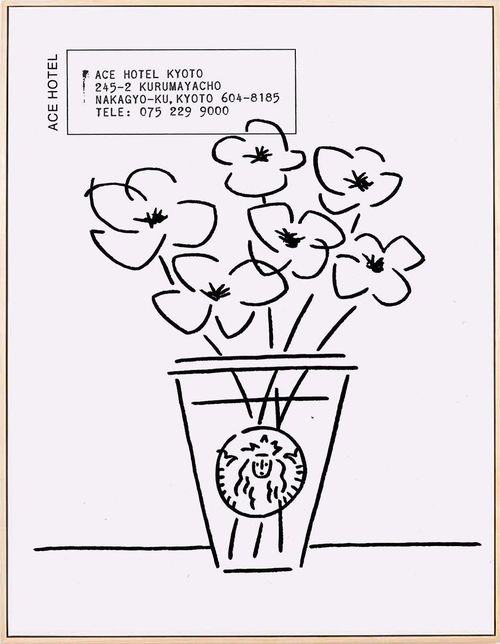 a monochrome minimal silhouette of flowers in a branded coffee cup