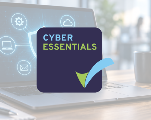 Cyber Essentials logo with a checkmark on a blurred laptop screen background showing digital security icons.