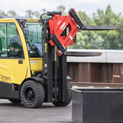 Yellow forklift with tilted forks