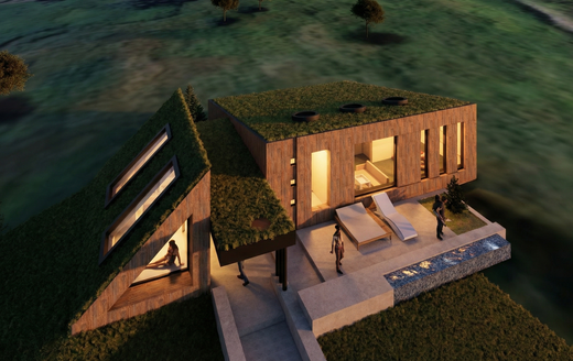 The green roof is not a feature. It is the hill. 