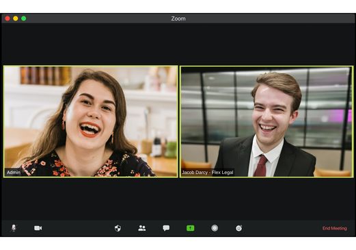 An interviewer, Jacob Darcy of Flex Legal, laughs during a virtual job interview with a woman mysteriously named "admin"