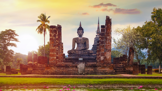 a large buddha statue in sukhothai historical park