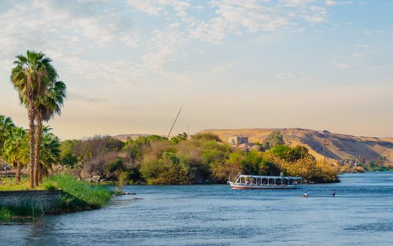 boat floating in the nile river in egypt on a sunny day