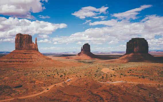 towering sandstone buttes in monument valley in arizona