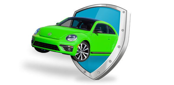 zelené vw auto vyjíždějící ze stříbrného štítu