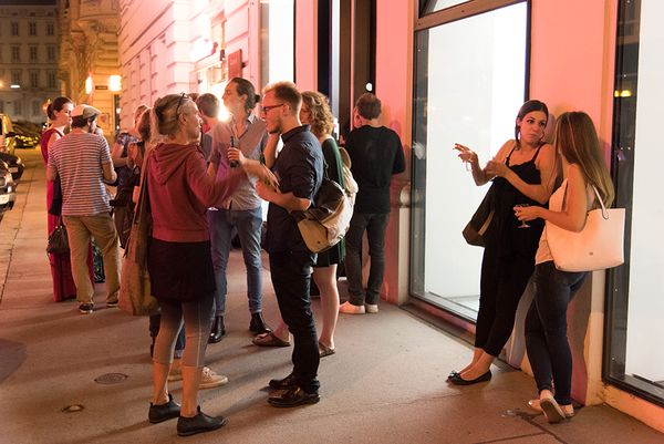People standing outside AIL | Image by ©