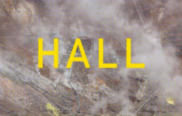 HALL typography on a landscape photography with smoke | Image by ©