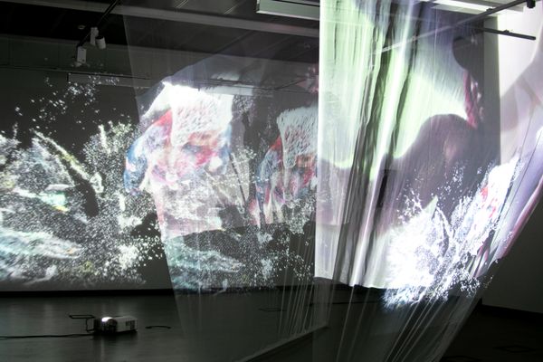 Projection of Video images on various screens in a space | Image by ©