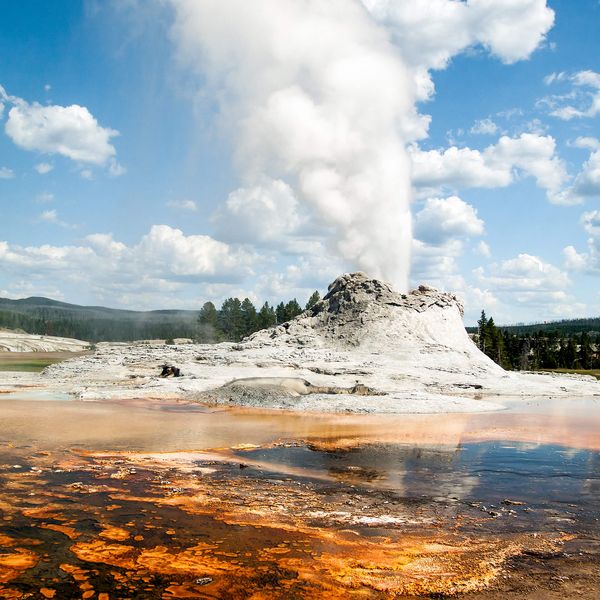 The Castle Geyser erupting at Yellowstone National Park