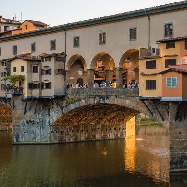 Angular view of Ponte Vecchio in Florence Italy at sunset