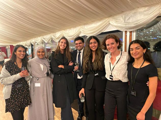 A spread of Flex Trainees are seen standing in a line, at 2023 event at the House of Lords, London.