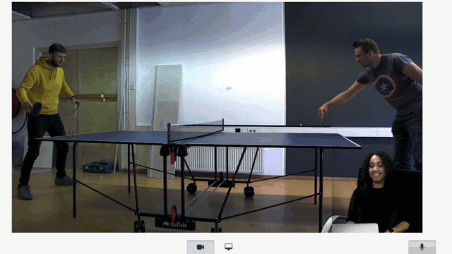 Animation of two people playing table tennis and presenter in the right bottom corner.