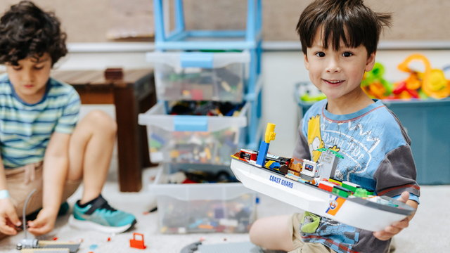 Child building a boat