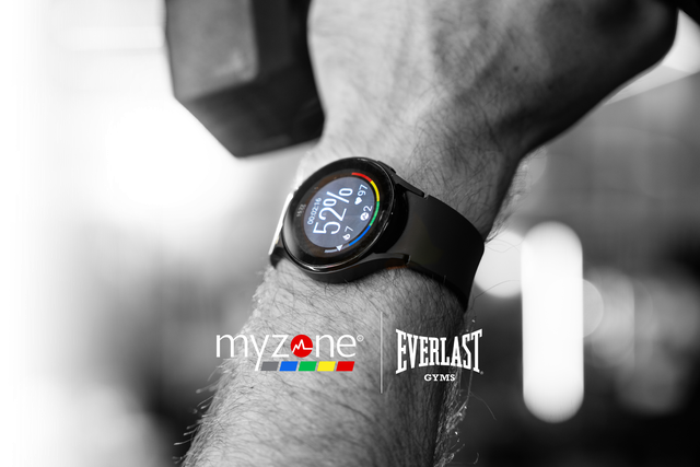 A close-up of a watch linked to Myzone, showing heart rate, Myzone effort points and calories