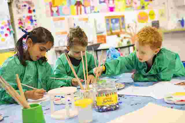 Kids painting together