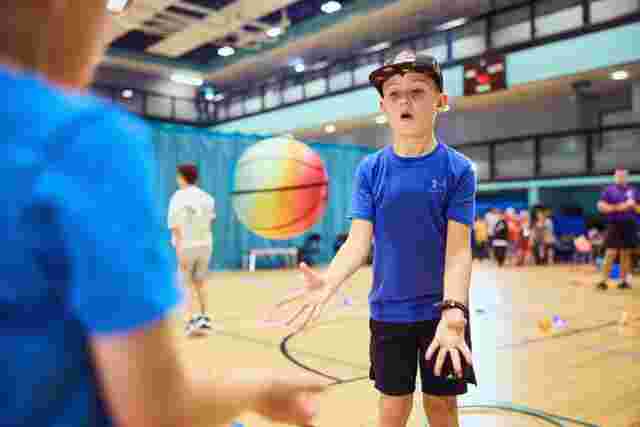 Child playing with a basketball