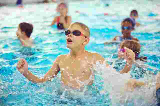 Children doing a group activity in the swimming pool