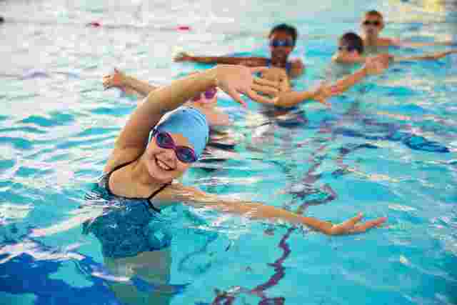 Children doing a group activity in the swimming pool