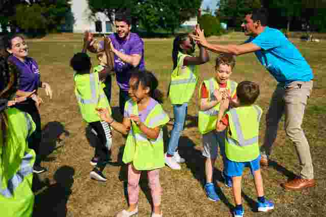 JAG staff and children playing outside