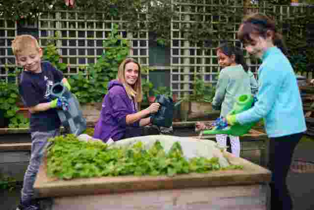 Gardening with staff member