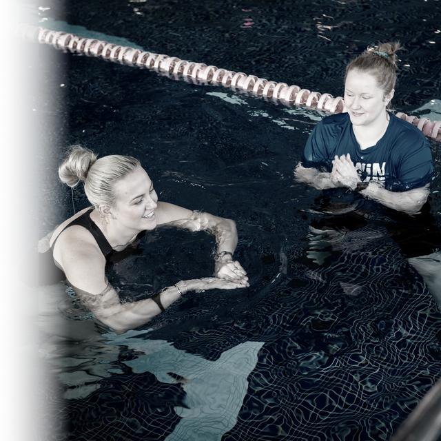 A Swimtime instructor teaching a bespoke swimming lesson