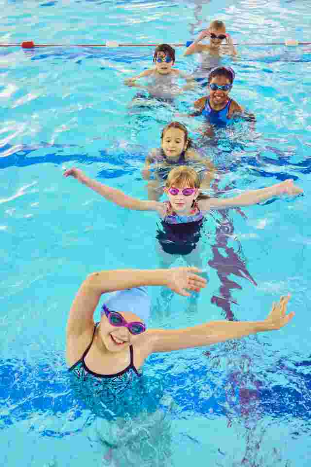 Children doing a group activity in the swimming pool