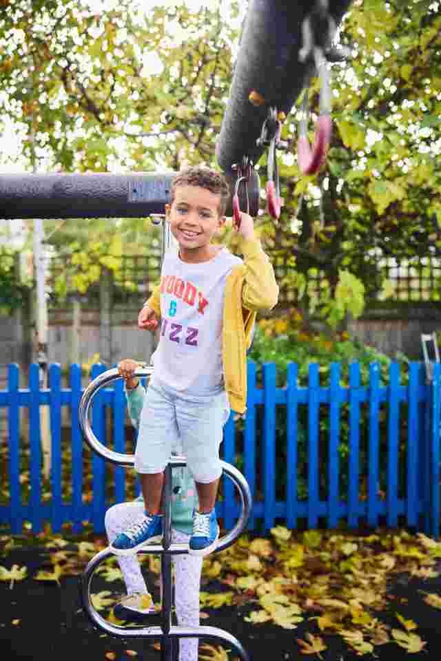 Child having fun on climbing frame
