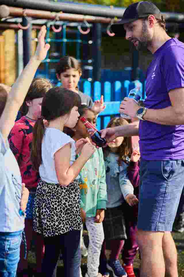 Children and staff member outside