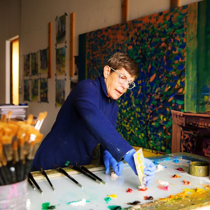 Deborah Brown applying paint to a palette 
