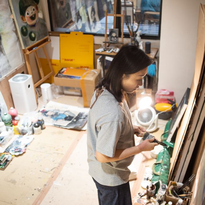 b.wing painting showing her studio in the background