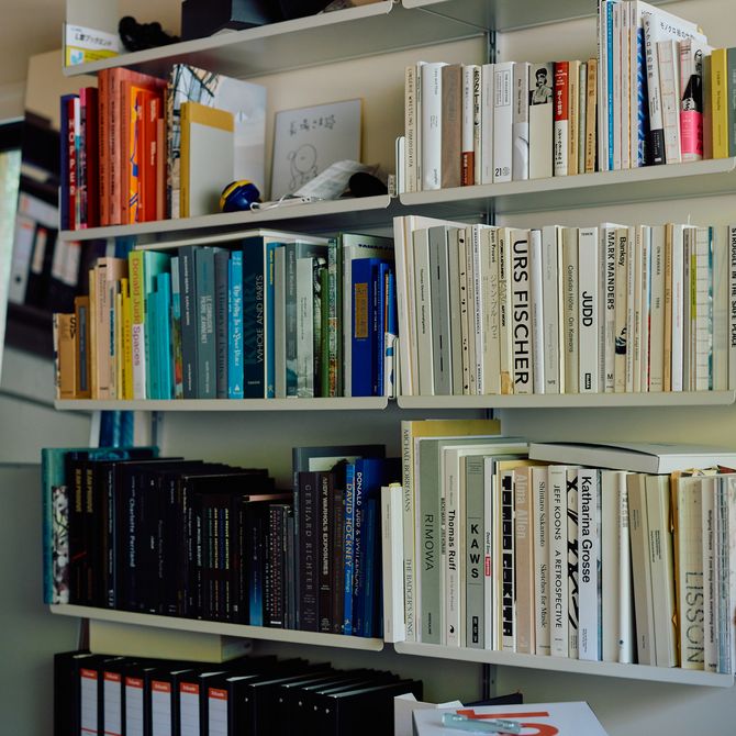 book shelves filled with books in Yu Nagaba's studio