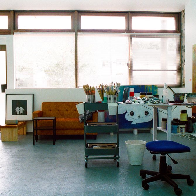 a view of Maiko Kobayashi's studio with paints and paintings