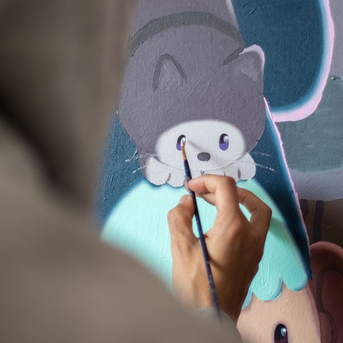 Imon Boy painting a cat