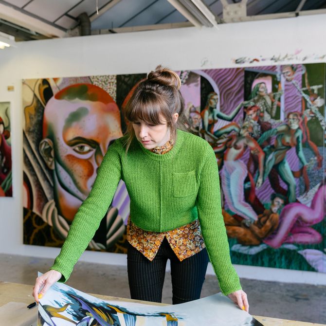 Jessie Makinson laying out a print in her studio