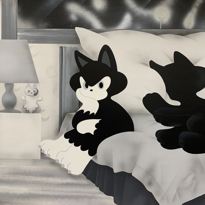 Greyscale painting of two cats sat on a bed