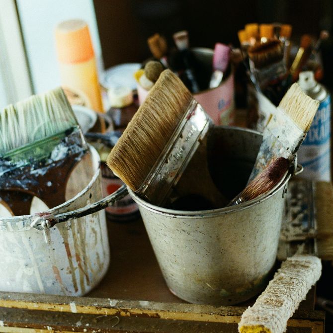 pots of paintbrushes of various sizes
