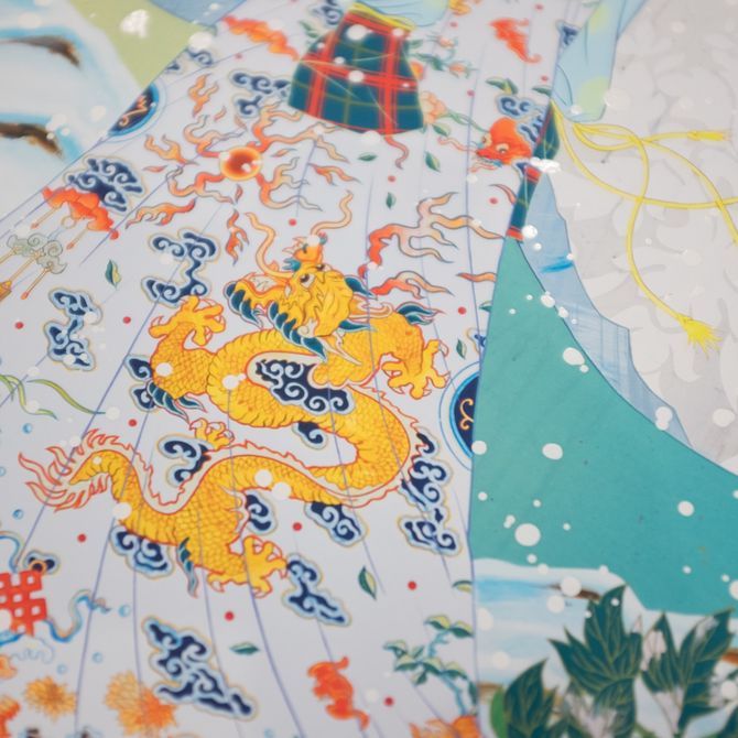 close-up detail of yellow dragon pattern in one of artist's paitings