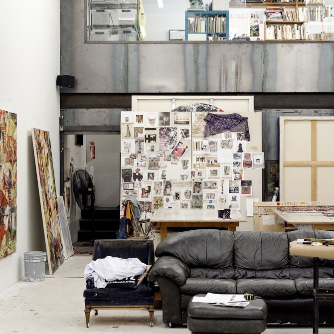 inside of the Angel Otero's studio with his works and sketches