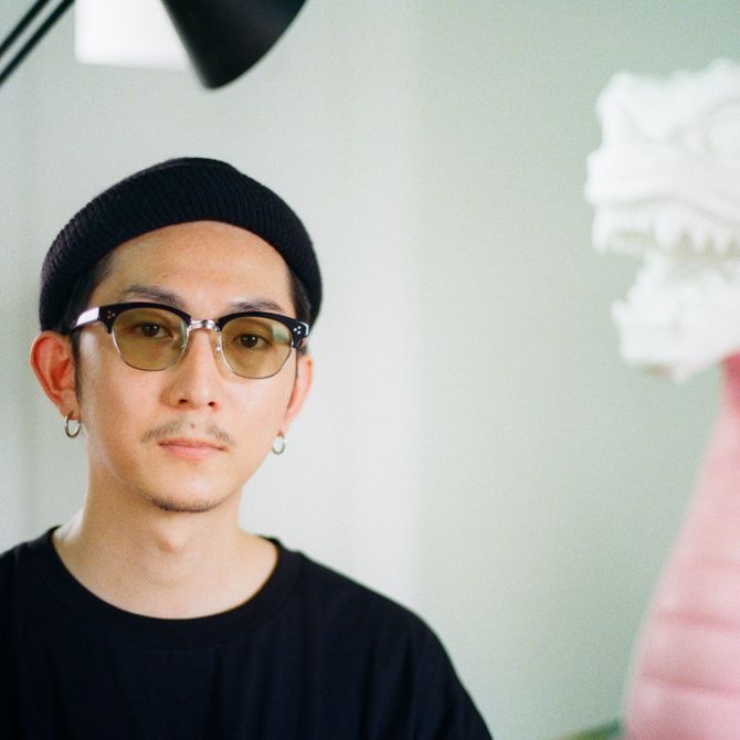 portrait shot of Takahiro Komuro in his studio