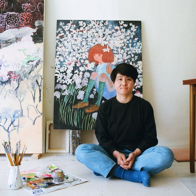 Makiko Kudo sitting on the floor in her studio